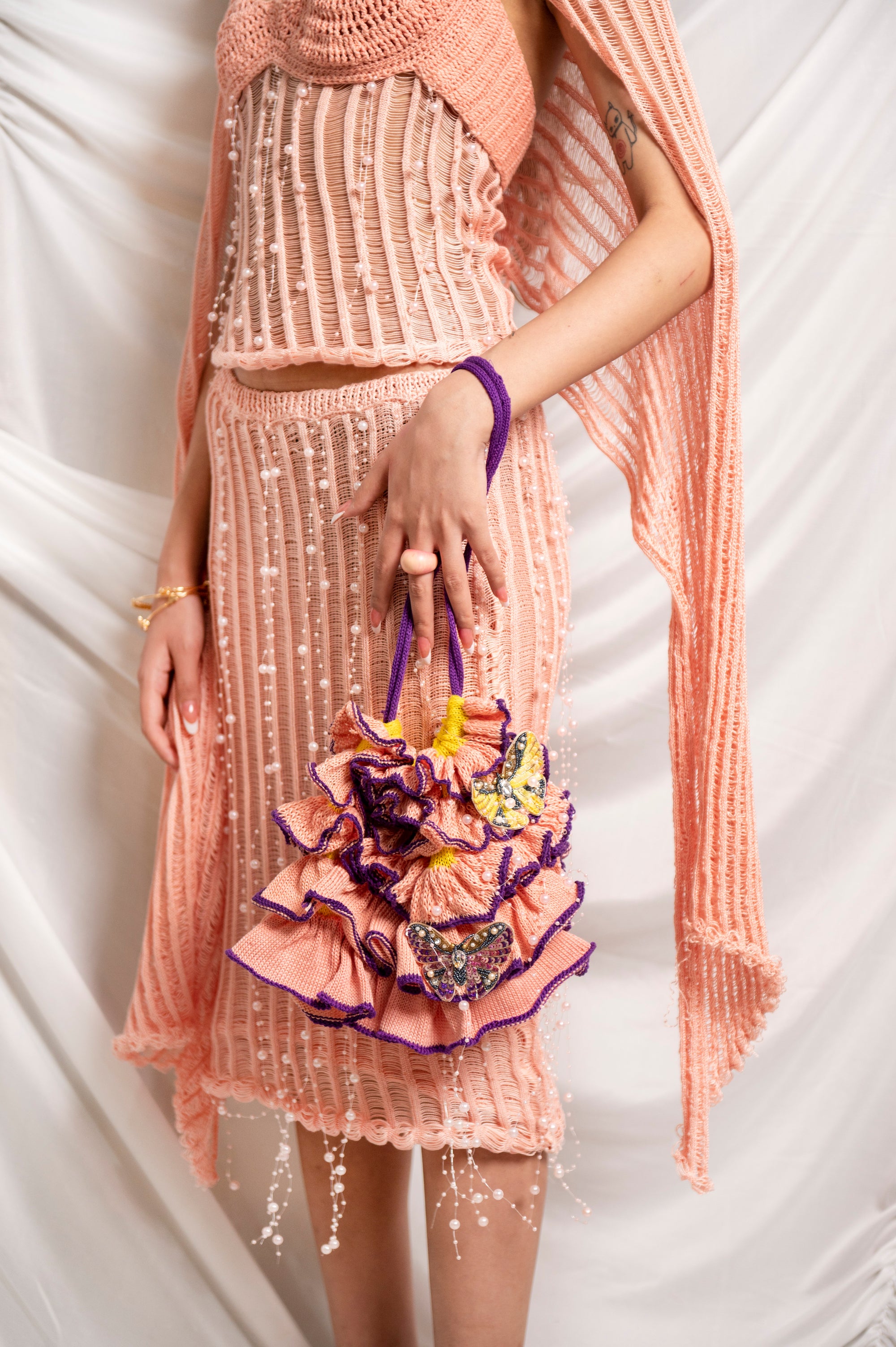 PEARL FLUTTER RUFFLE POTLI BAG